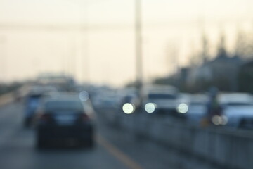 highway traffic with safety barrier on road asphalt, blurred image