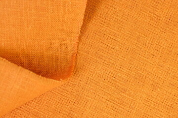 orange hemp viscose natural fabric cloth color, sackcloth rough texture of textile fashion abstract...