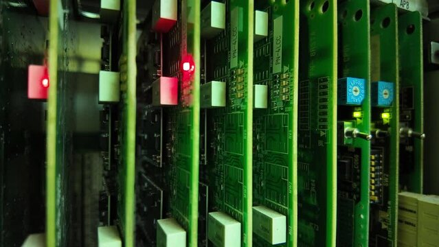 PABX phone motherboard with a flashing light indicating the digital connection status. communication technology