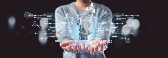 Businessman is showing concept of future technology and internet connection network with AI as controller. A graphic floated in the air on his hand. Data center network concept.