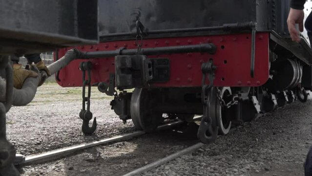Enganche de locomotora a vapor con sus vagones