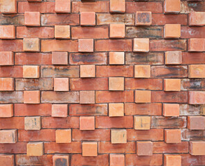 Red brick walls are suitable for use as a background.