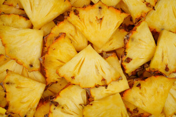 Summer fruit background concept, cuts of pineaapple as tropical fruit concept background 