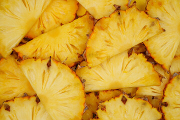 Summer fruit background concept, cuts of pineaapple as tropical fruit concept background 