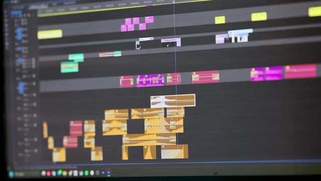 Close-up of a video editing timeline in action, showing dynamic clip manipulation.