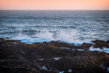 Volcanic rock formations at Cape Perpetua in Oregon along Pacific coast.