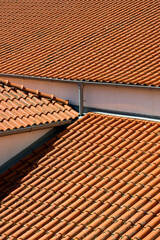 Close up view of red Tiles of different homes in Porto, Portugal