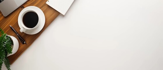 Simple wooden desk with a laptop, a cup of coffee, and a notebook, minimalist workspace, white background