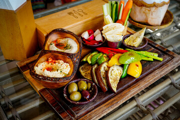Mezze Plate. Whit Hummus, Olives, Crudites, Pita Bread, Baba Ghanoush. Various appetizing spanish mezze dishes.