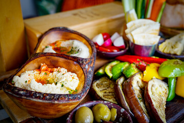 Mezze Plate. Whit Hummus, Olives, Crudites, Pita Bread, Baba Ghanoush. Various appetizing spanish...