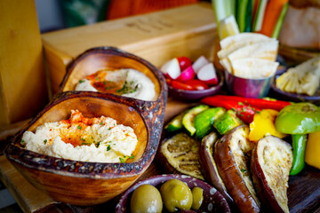 Mezze Plate. Whit Hummus, Olives, Crudites, Pita Bread, Baba Ghanoush. Various appetizing spanish mezze dishes.