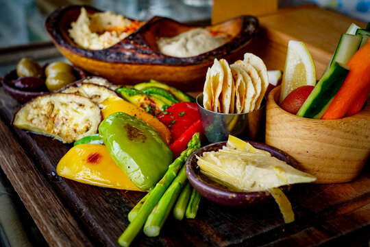 Mezze Plate. Whit Hummus,&nbsp;Olives, Crudites, Pita Bread, Baba Ghanoush. Various appetizing spanish mezze dishes.