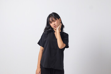 Portrait of unhealthy Asian woman in casual shirt touching her neck and feeling exhausted after work. Businesswoman concept. Isolated image on white background