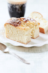 Simple yeast cake on bright background. Front view. Close up.
