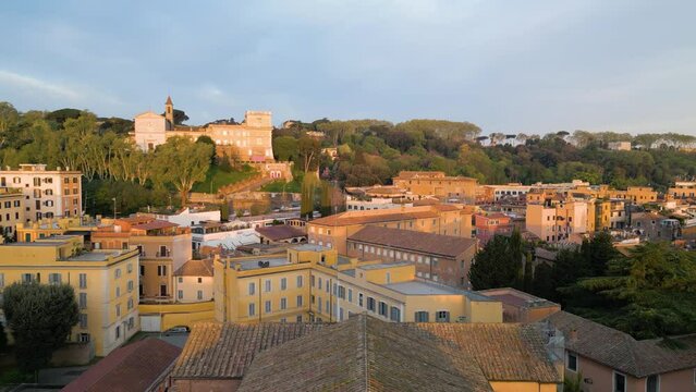 Aerial Pullback Reveals Basilica of Santa Maria in Trastevere at Sunrise in Rome, Italy