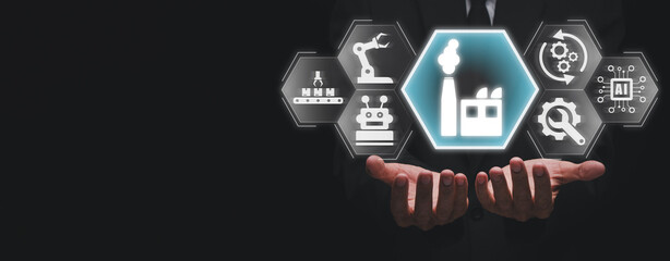 Factory concept, Businessman hands holding factory icon on virtual screen.