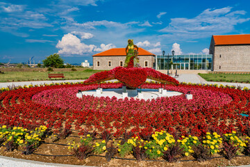 Vibrant floral sculpture in Kladovo, Serbia on a bright summer day
