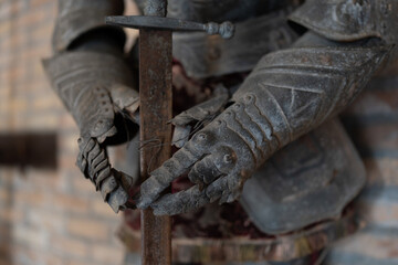 medieval black knight in armor with sword
