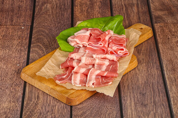 Sliced pork bacon in the bowl