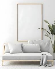 Contemporary living room interior with a blank vertical poster frame on a white wall above a minimalist sofa with cushions and a plant decor. 