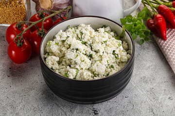 Curd cheese with green herbs