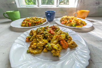Chicken stewed with vegetables and kefir with chives.
