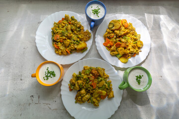 Chicken stewed with vegetables and kefir with chives.