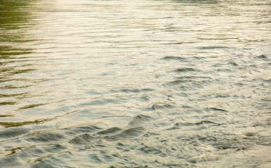 The surface of the water in the river as an abstract background. Texture