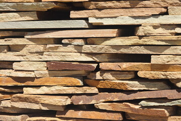 trade in natural stone in the open air, stone in stacks and heaps, stone for landscaping for sale 2