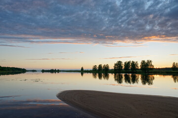 Beautiful and serene summer evening at the sandy beach, Bothnian Bay, Finland