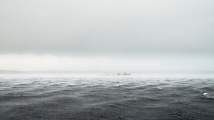 Storm clouds and heavy rain over the coast, Bothnian Bay, Finland