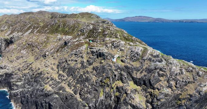 Ireland Epic locations drone circling Sheep&rsquo;s Head Lighthouse on the Sheep&rsquo;s Head Peninsula West Cork on the Wild Atlantic Way with Bantry bay