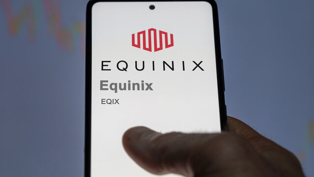 April 09th 2024 , Redwood City, California. Close up on logo of Equinix on the screen of an exchange. Equinix price stocks, $EQIX on a device.