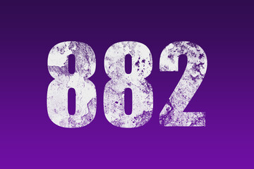 flat white grunge number of 882 on purple background.