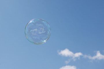soap bubbles flying in the cloudy sky