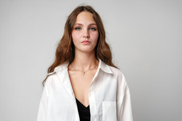 Woman With Long Hair Wearing a White Shirt
