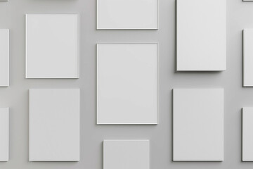 Small rectangular blank posters arranged in a grid in a minimalist wide gallery.