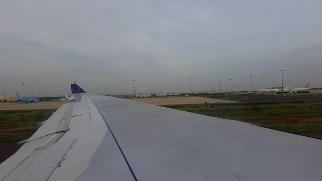 Airliner window view while taxiing at Blaise Diagne International airport, Senegal