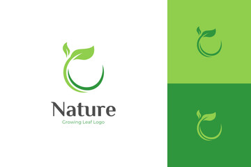 Nature growing leaf logo icon design, circle Earth with plant graphic element, symbol, sign for green Earth Day, nature globe and greening earth logo template
