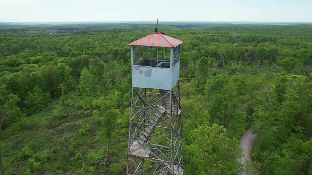 The Mountain Fire Lookout Tower, located in Mountain, Wisconsin was erected by the Mountain CCC and completed in 1935.  This tower stood guard over the Nicolet National Forest.