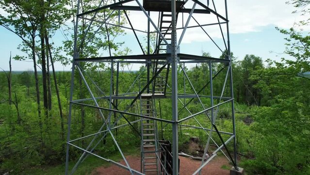 The Mountain Fire Lookout Tower, located in Mountain, Wisconsin was erected by the Mountain CCC and completed in 1935.  This tower stood guard over the Nicolet National Forest.