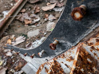 small rusted nut installed imperfectly