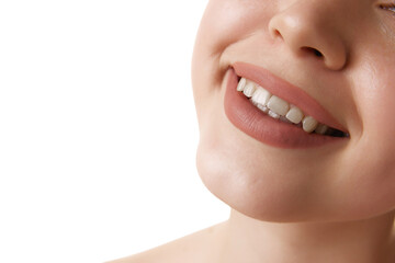 Obraz premium Close up of beautiful wide female smile against white studio background. Oral care dentistry, stomatology. Concept of hygiene treatments, dental health, wellness. Ad