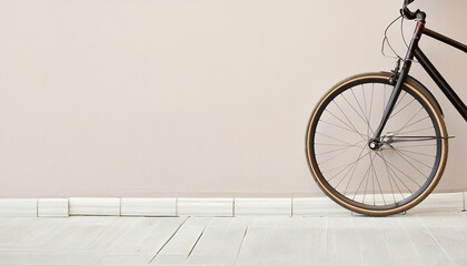 Bicycle Wheel Against Wall with empty space for text