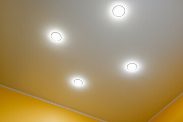 Plasterboard ceiling with built-in lighting. Drywall ceiling.