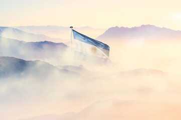 Argentina flag disappears in beautiful clouds with fog.