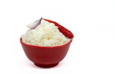Panta Bhat or Night Old Fermented Rice with Raw Onion and Chili in Red Bowl Isolated on White Background with Copy Space, Also Known as Poita Bhat or Ponta Bhat