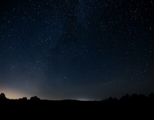 dark sky at night, filled with an abundance of twinkling stars shining brightly above