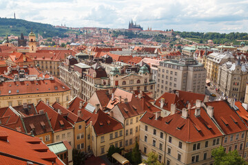Obraz premium Aerial view of the rooftops of the historical buildings in Prague, Czech Republic