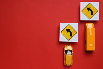 Traffic rules and motor vehicles on a red background.